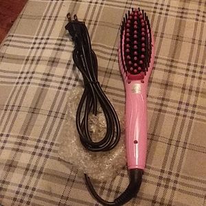 Heated brush that straightens your hair.